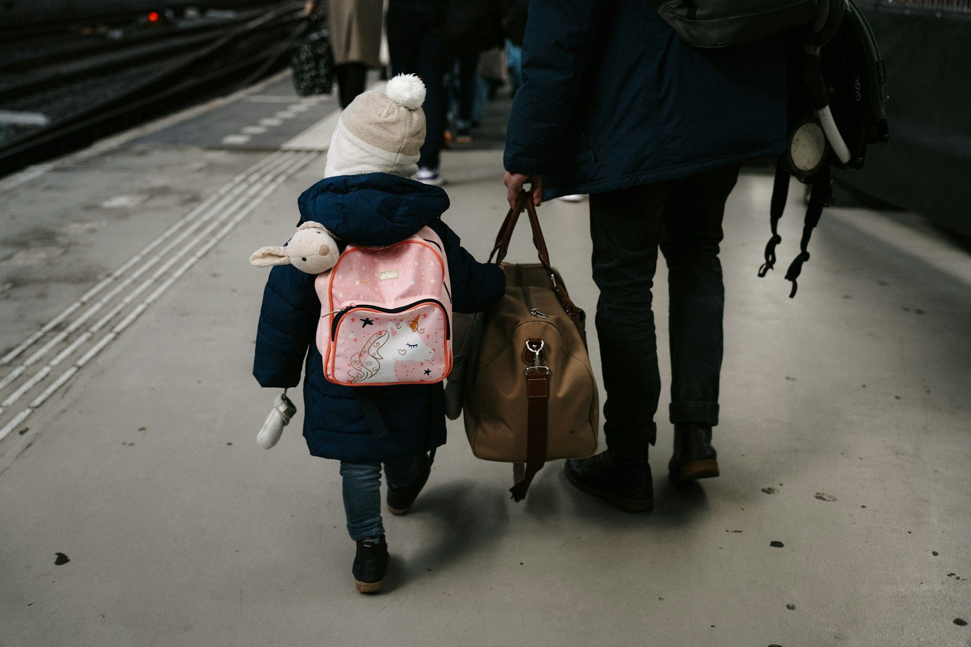 child walking with backpack europe.jpg